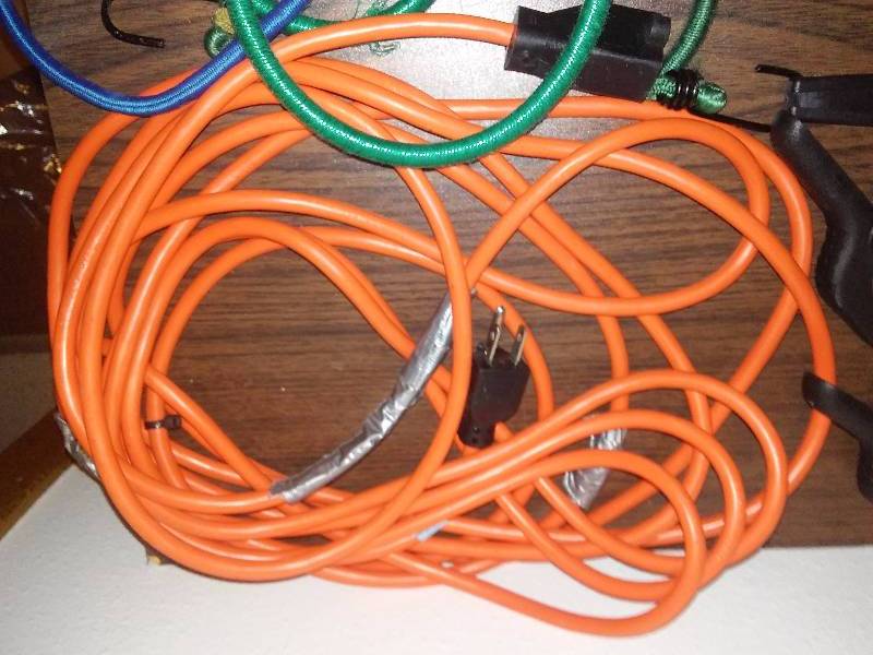 lot 125 image: Garage Supplies Bungee Cords, alloy clips, extension cord, grommets, slip clips, clamps, eye screws, swivel clips and more