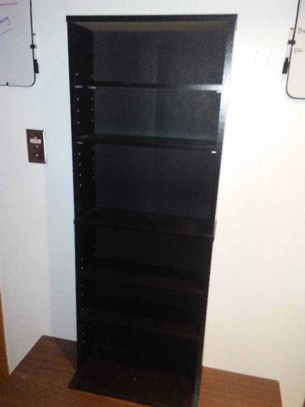 lot 132 image: Media or shelf Storage, Black, adjustable shelves, Dorm Perfect, 45 x17 x 6 inches