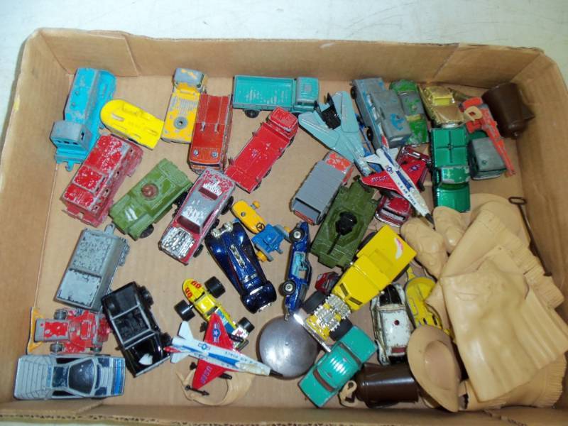 lot 47 image: Vintage Toy cars, truck, and airplanes with cowboy accessories