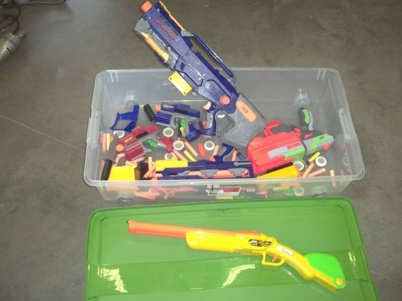 lot 53 image: Nerf Gun Assortment with Plastic tote and cover
