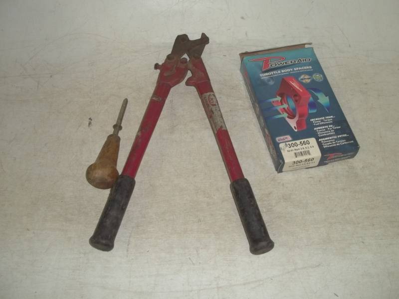 lot 168 image: Throttle Body Spacer and tools