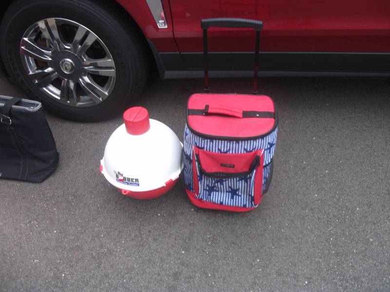 lot 12 image: Big Bobber Floating Cooler& Cynthia Rowley Roller Cooler