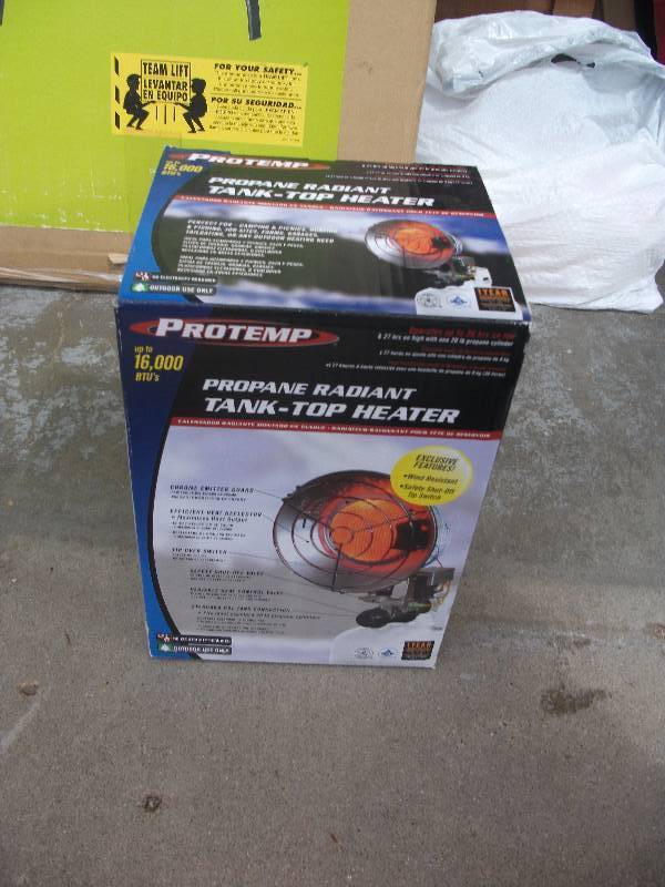 lot 18 image: Brand New In Box Protemp Propane Radiant Tank Top Heater