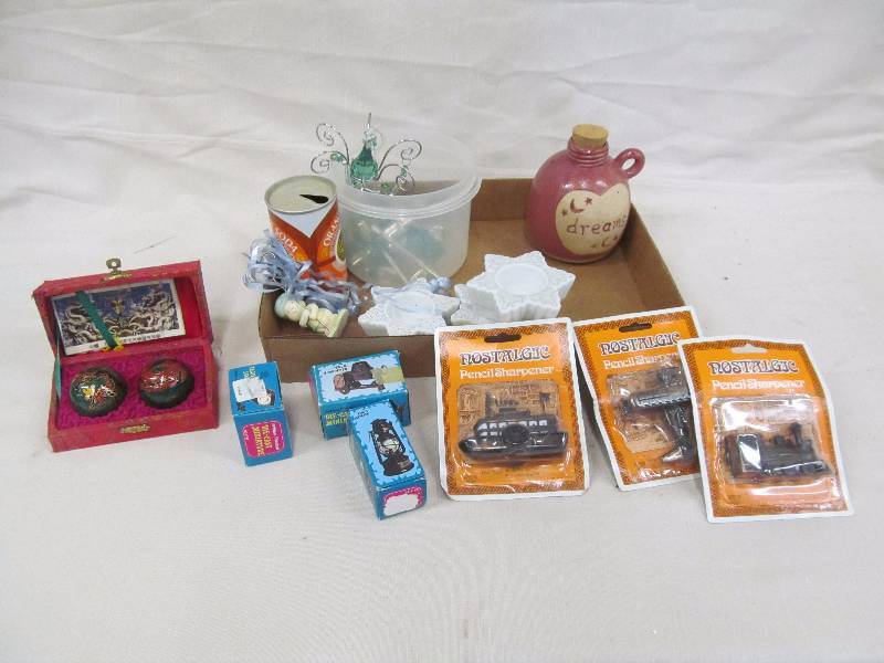 lot 47 image: pencil sharpeners, Chinese stress balls, and others