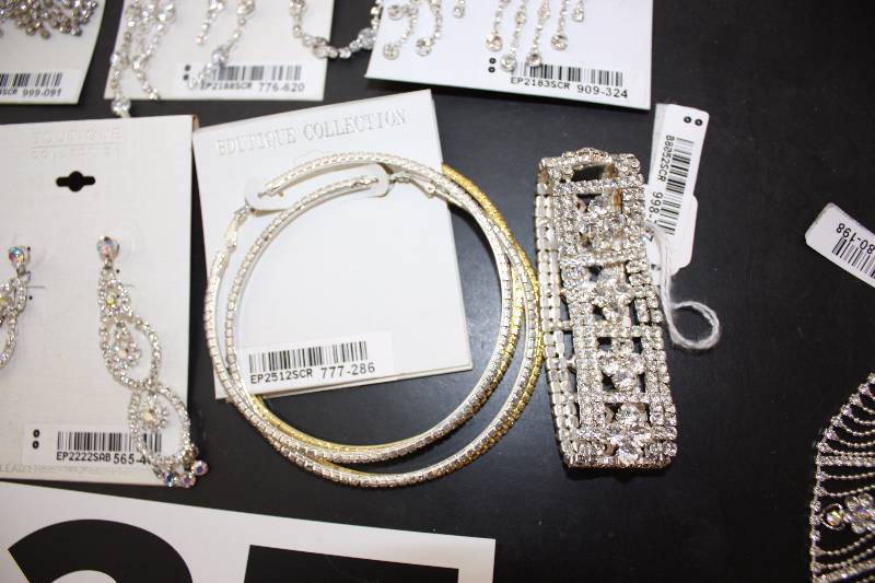 lot 137 image: 5 Rhinestone bracelets and 9 earring sets. NEW