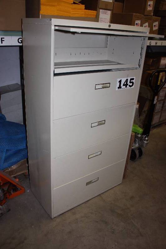 lot 145 image: 6 foot Lateral File Cabinet with 3 drawers, top sliding doors