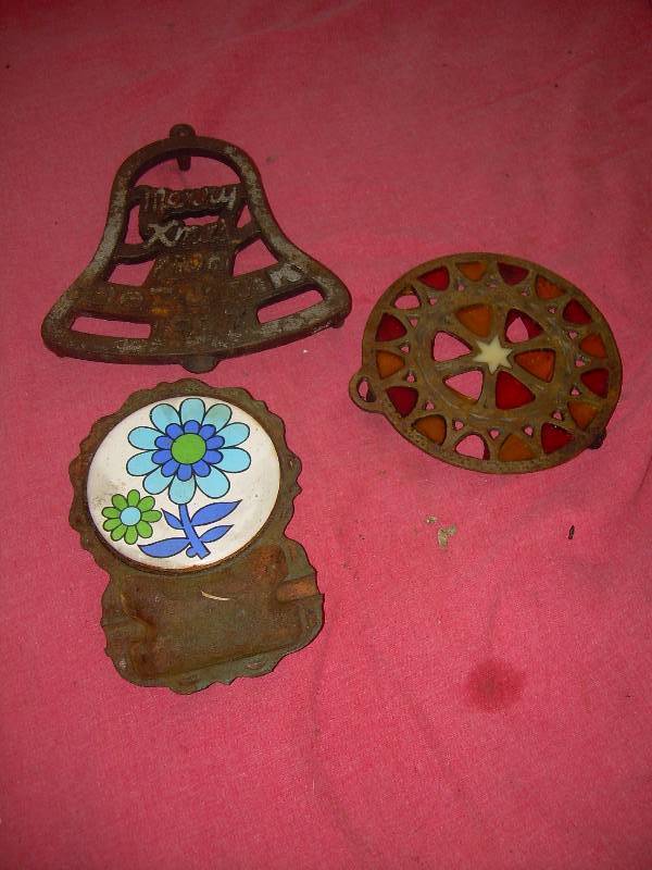 ANTIQUE CAST IRON TRIVETS