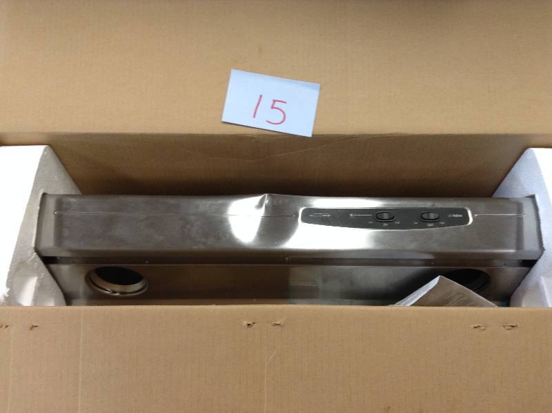 Nutone Delluxe 30 in Stainless teel Range hood dengt on top