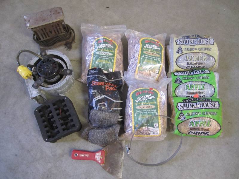 lot 243 image: Lot of smoker wood chips fans steel...