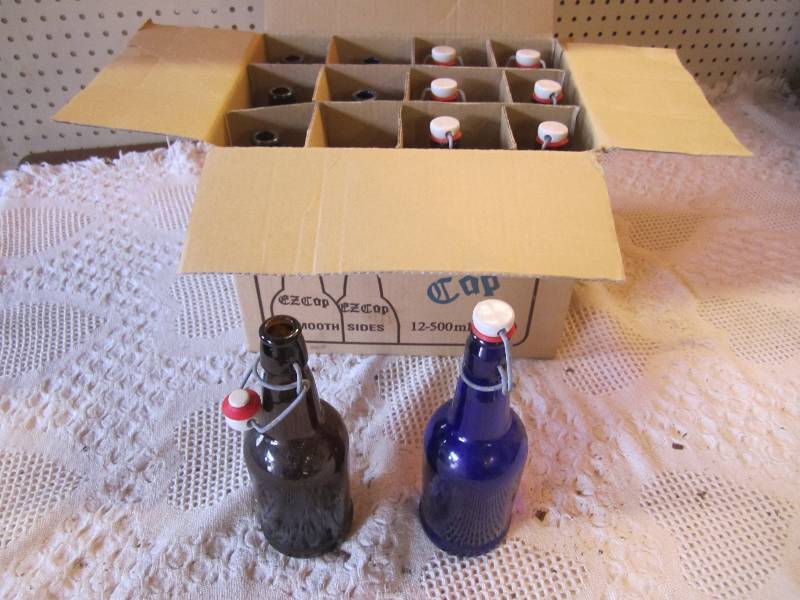lot 276 image: Lot of 13 Swing Top Glass Bottles 9...