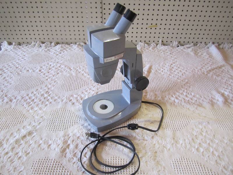 lot 15 image: American Optical Company Microscope...