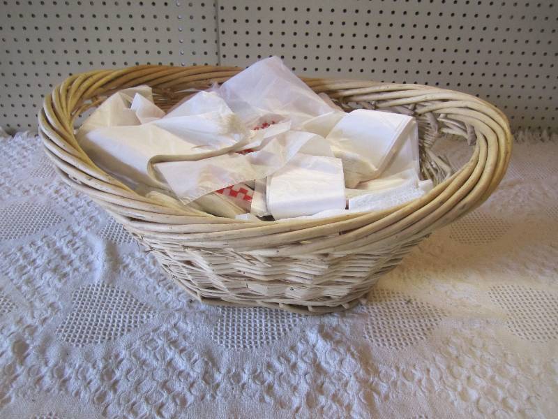 lot 83 image: Basket full of grocery bags....