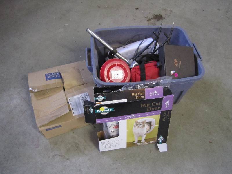 lot 195 image: Tote full of misc items. Paper shre...