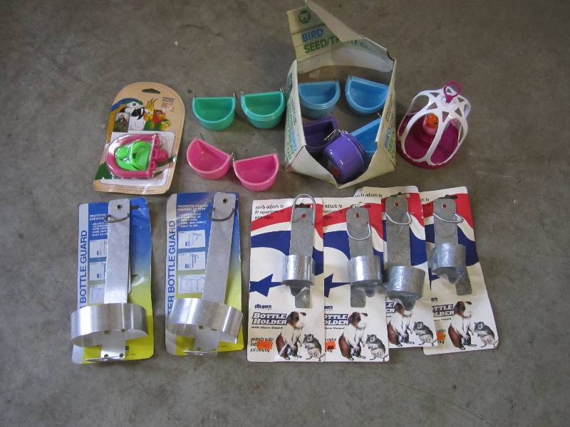 lot 205 image: Lot of Bird toys feeding cups and w...