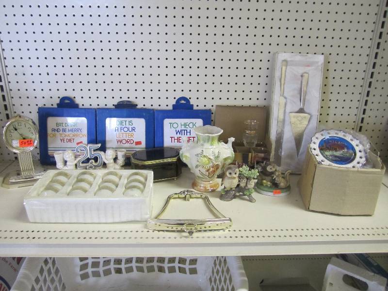 lot 213 image: Misc Decor items in a laundry baske...