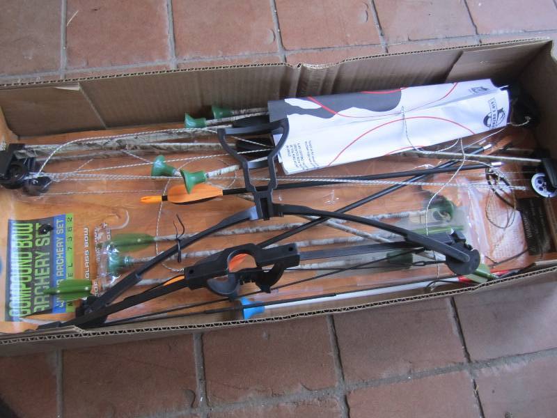 lot 224 image: Lot of misc kids items. Work bench ...