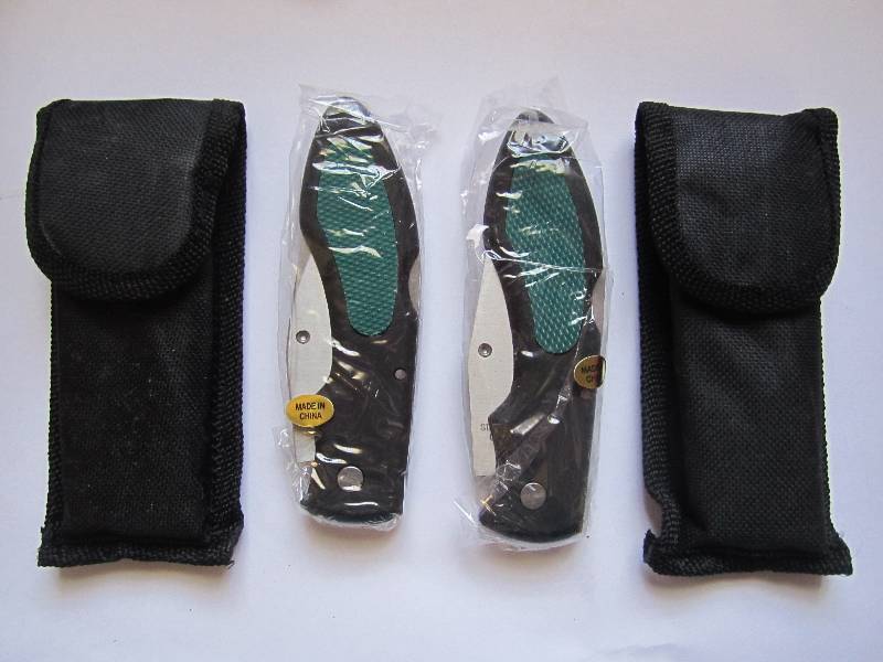 lot 233 image: Lot of 2 folder knives with sheath....