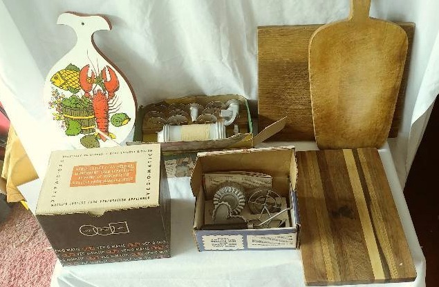 Various vintage Kitchen Equipment in boxes