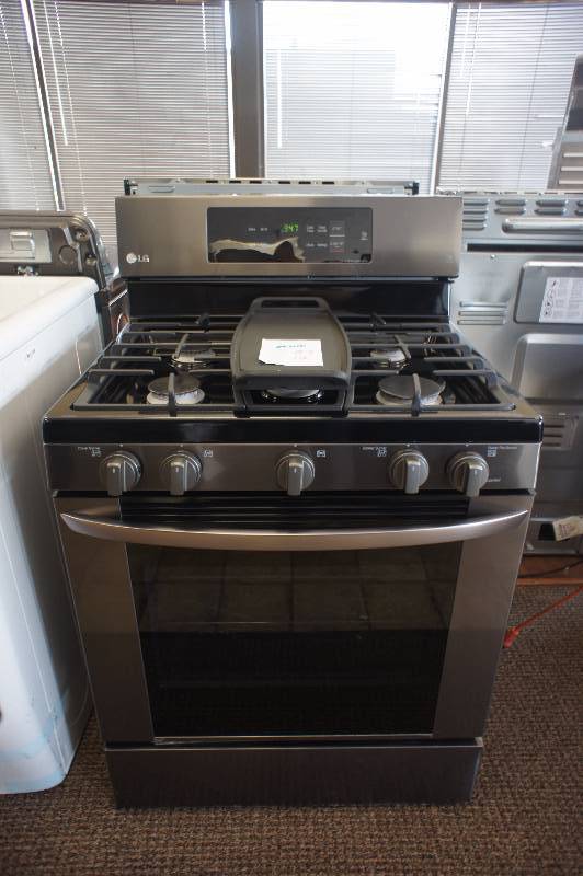 lot 12 image: New - Scratch & Dent LG Model # (LRG3061BD) - Gas Range - Freestanding - 5.4 cu ft - Black Stainless Steel Color - Tested Works - MSRP $ 1599.99
