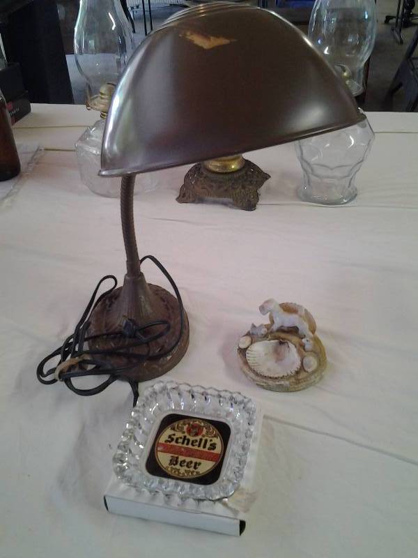 lot 41 image: Vintage Cast Iron Desk Lamp, Shells Beer Ash Tray, & Other Shells Ash Tray