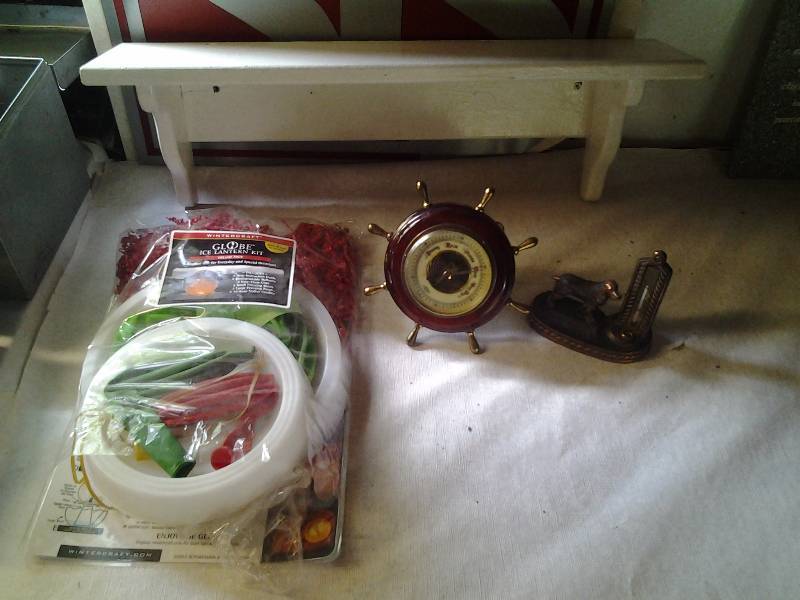 lot 97 image: Wood Wall Shelf, Ice Globe Lantern Kit, Dog Thermometer, Ships Wheel Barometer