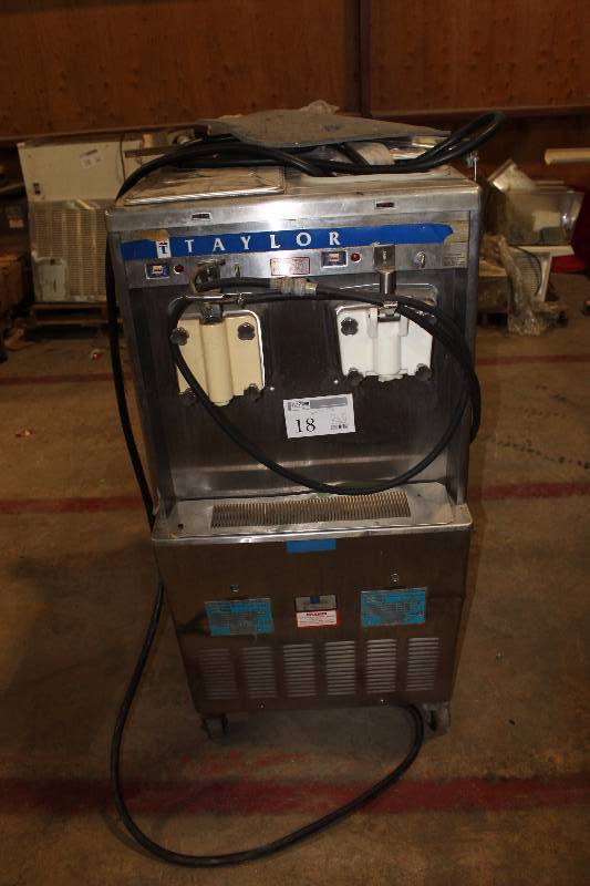 lot 18 image: Taylor Commercial Stainless Steel Rolling Dispenser
