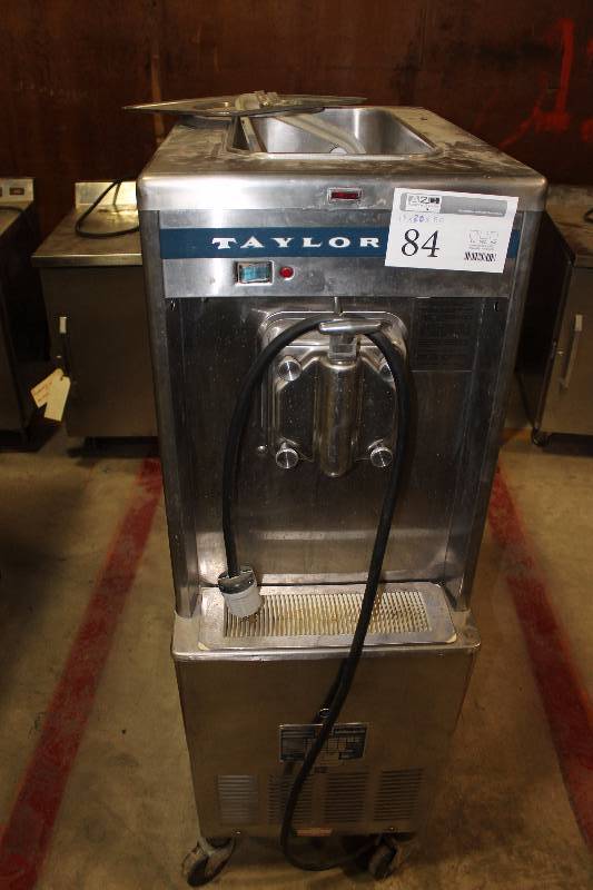 lot 84 image: Taylor Commercial Stainless Steel Rolling Dispenser