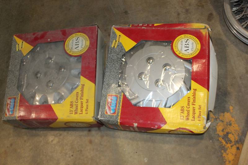 lot 240 image: Lot of (2) Boxes of 13in. ABS Wheel Covers