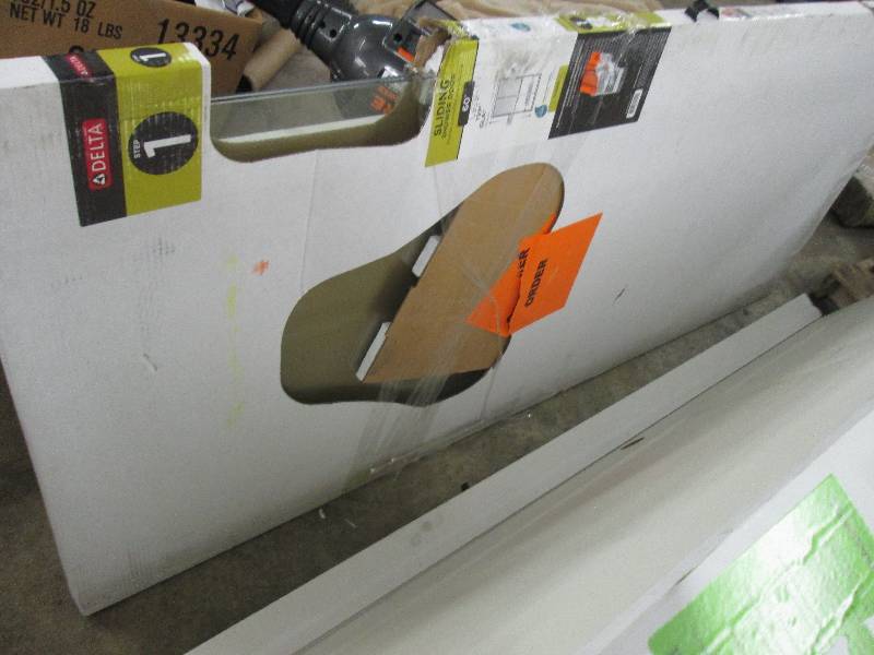 lot 23 image: Delta 60 in. Sliding Shower Door Gl...