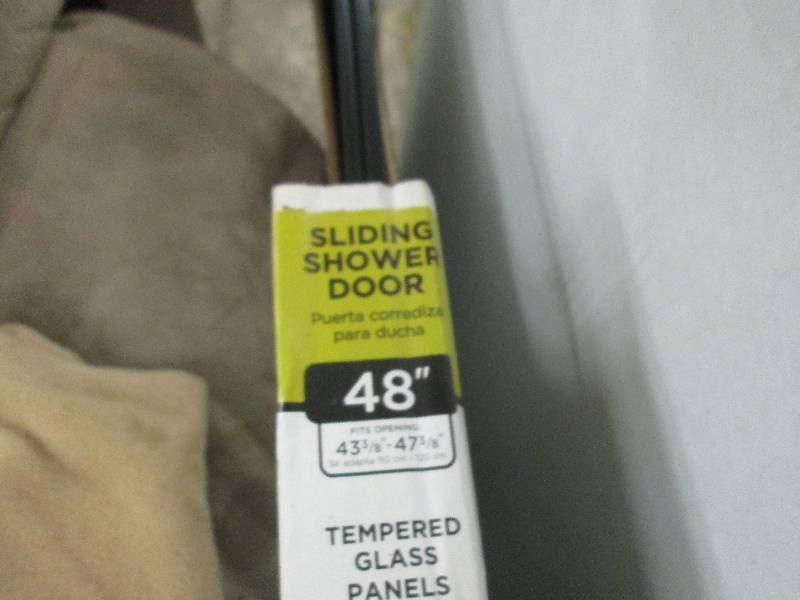 lot 24 image: Delta 48 in. Sliding Shower Door Gl...
