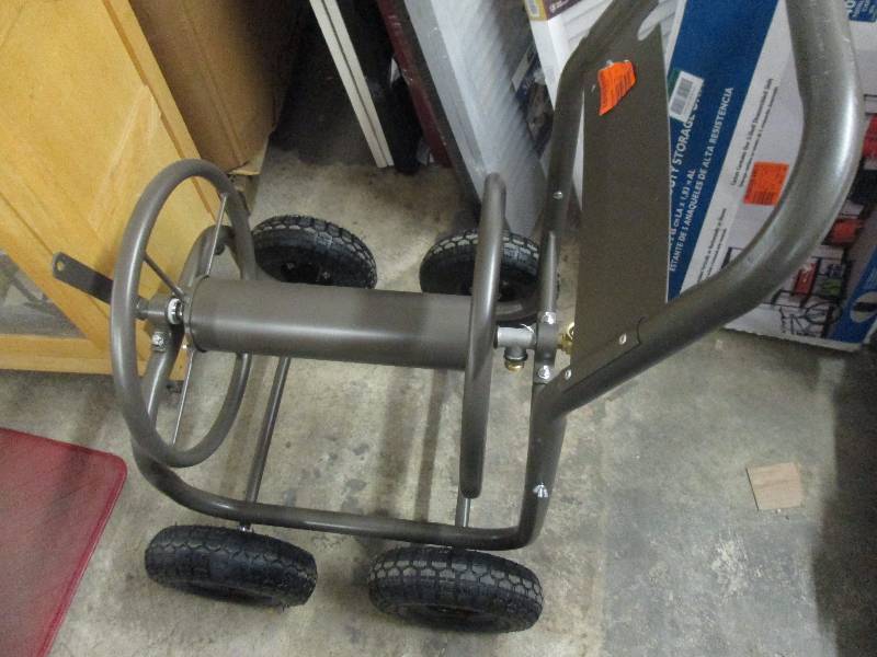 lot 80 image: Hampton Bay 4-Wheel Hose Cart out o...