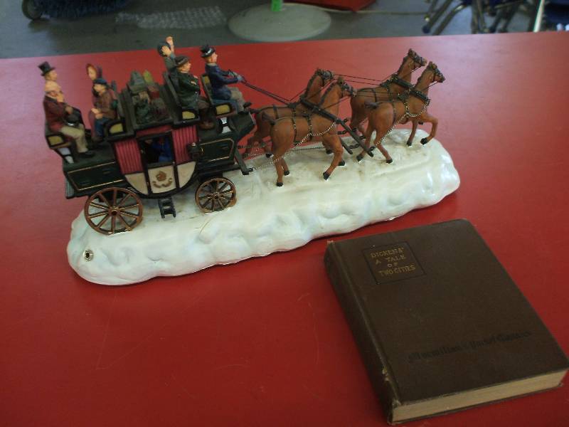 1915 EDITION OF TALE OF TWO CITIES AND A HORSE DRAWN CARRIAGE