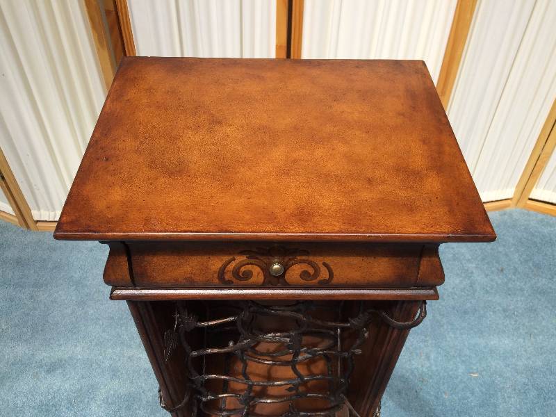 lot 11 image: Lovely And Unique Wood Bar Cabinet Wine Rack With Drawer - Metal Vines That Reach Around To The Outside - Drawer Is Perfect To Store Wine Opener Etc - Simply Divine & Quality Made Excellent Condition
