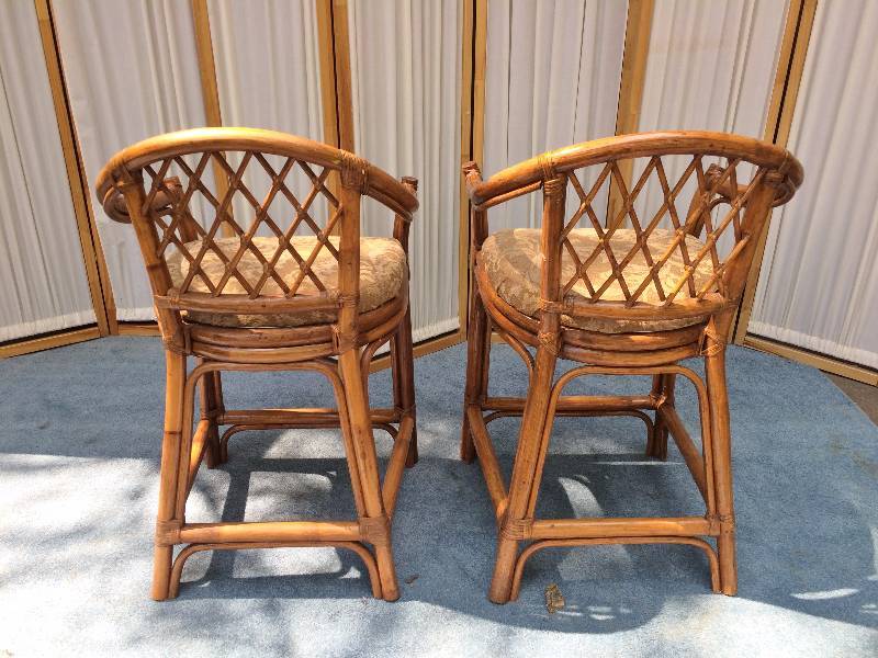 lot 52 image: 2 Mid Century Vintage Tiki BOHO Rattan Bentwood Bamboo Upholstered Counter Bar Stools Chairs With Arm Rests - Bindings Are Tight And Very Sturdy Still
