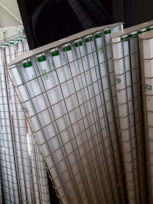 5, 8 bulb T8 type Fluorescent fixtures.. 2ft x 4ft