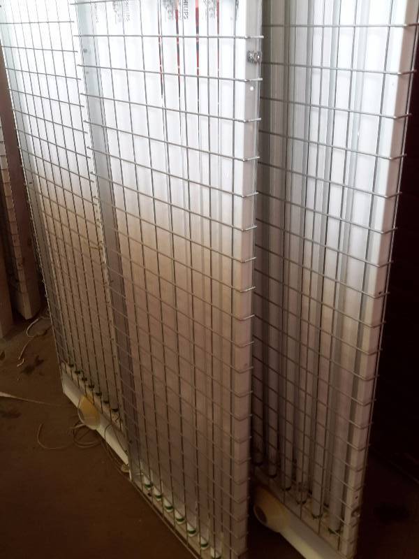 4, 8 bulb T8 type Fluorescent fixtures.. 2ft x 4ft