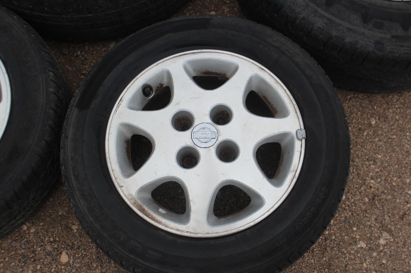 Set of Nissan 20560R15 Aluminum Wheels and Tires