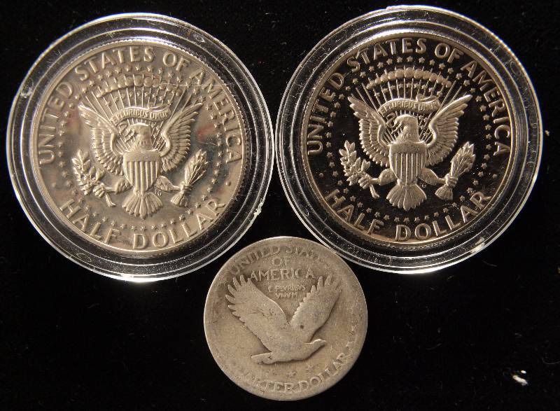 lot 38 image: GROUP OF 3 COINS 2 PROOF KENNEDY HALVES & 1 SILVER STANDING LIB. 25C