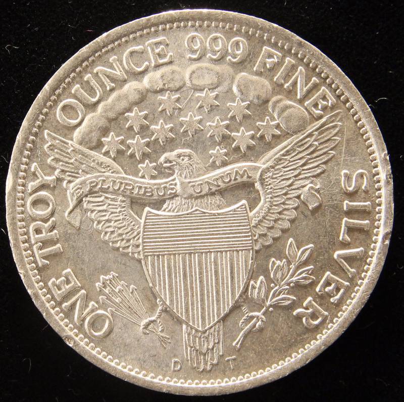 lot 39 image: 1 TROY OZ. .999 FINE SILVER FLOWING HAIR DESIGN
