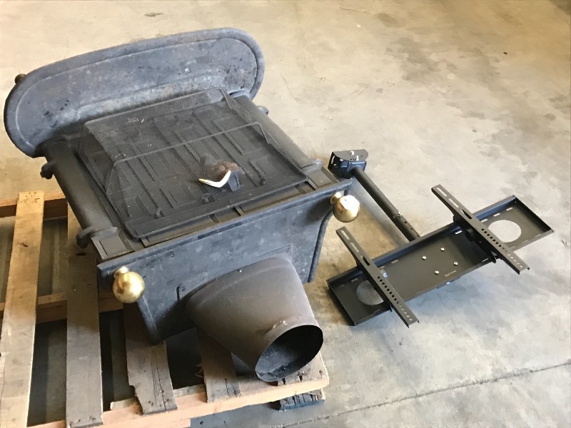 lot 57 image: T.V. Mount & Woodstove