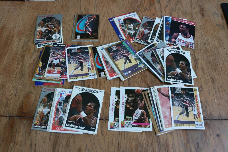 lot 112 image: 100 Clyde Drexler cards...