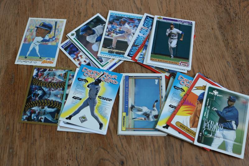 lot 124 image: 40 Ken Griffey JR cards...