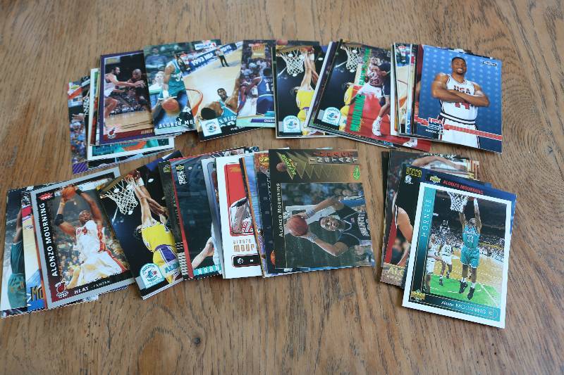lot 132 image: 80 Alonzo Mourning cards...