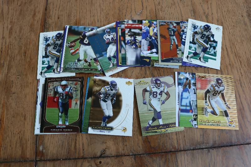 lot 136 image: 30 Randy Moss cards...