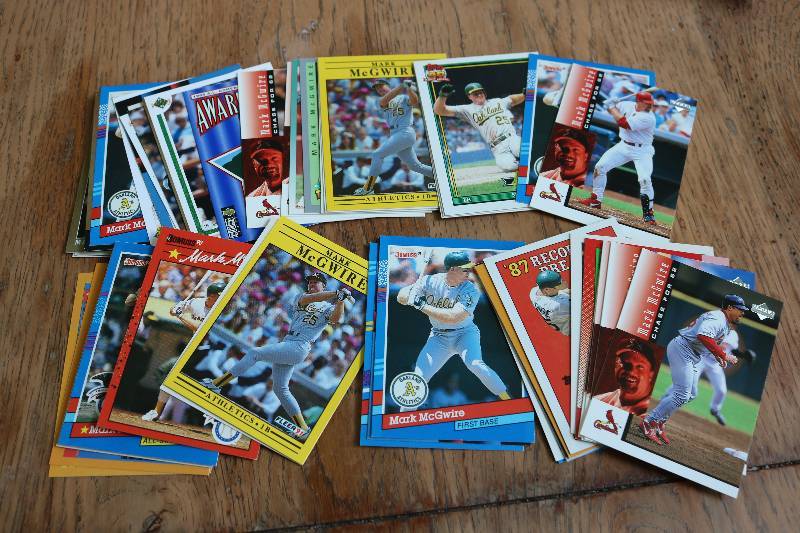 lot 142 image: 50 Mark McGwire cards...