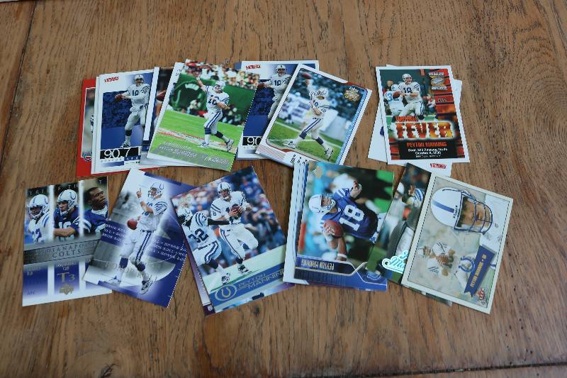 lot 118 image: 23 Peyton Manning cards...