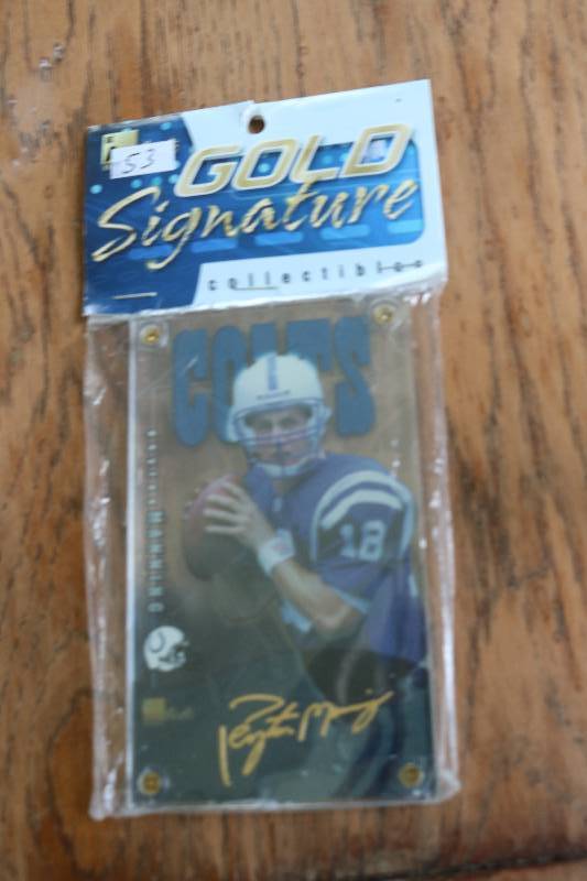 lot 153 image: Peyton Manning cards...