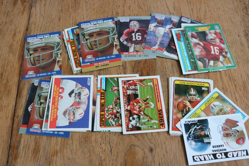 lot 155 image: 50 Joe Montana cards...
