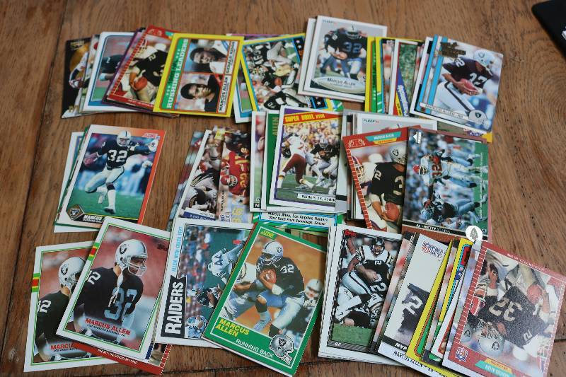 lot 156 image: 100 Marcus Allen cards...