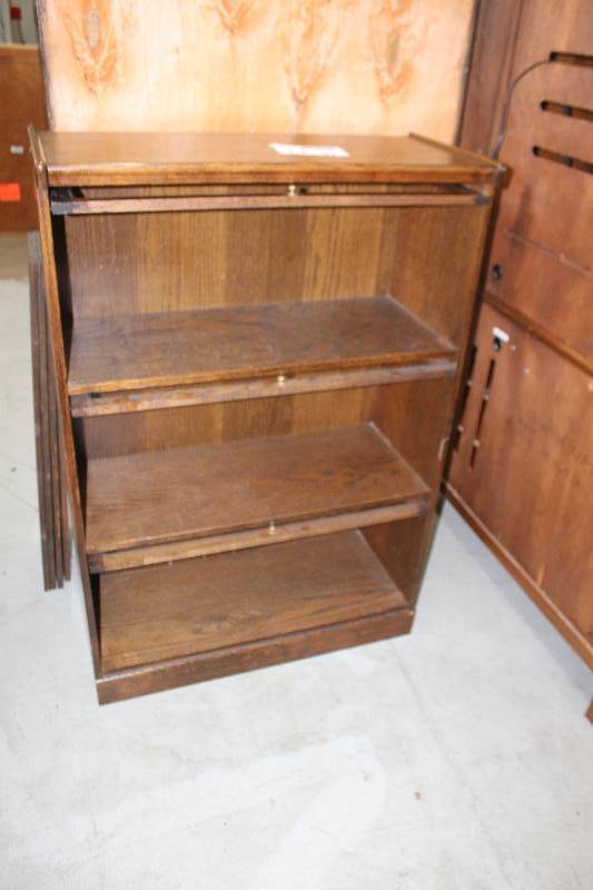 lot 14 image: 3-Door 3-Shelf Wood Bookcase
